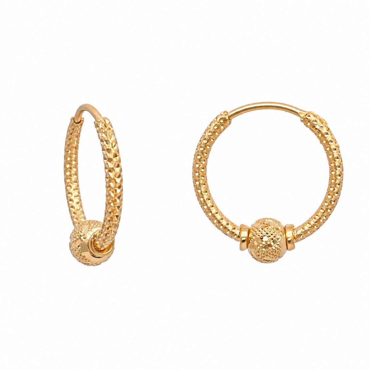 Close-up of 5mm diamond cut gold bead charm on 22ct textured hoop earring