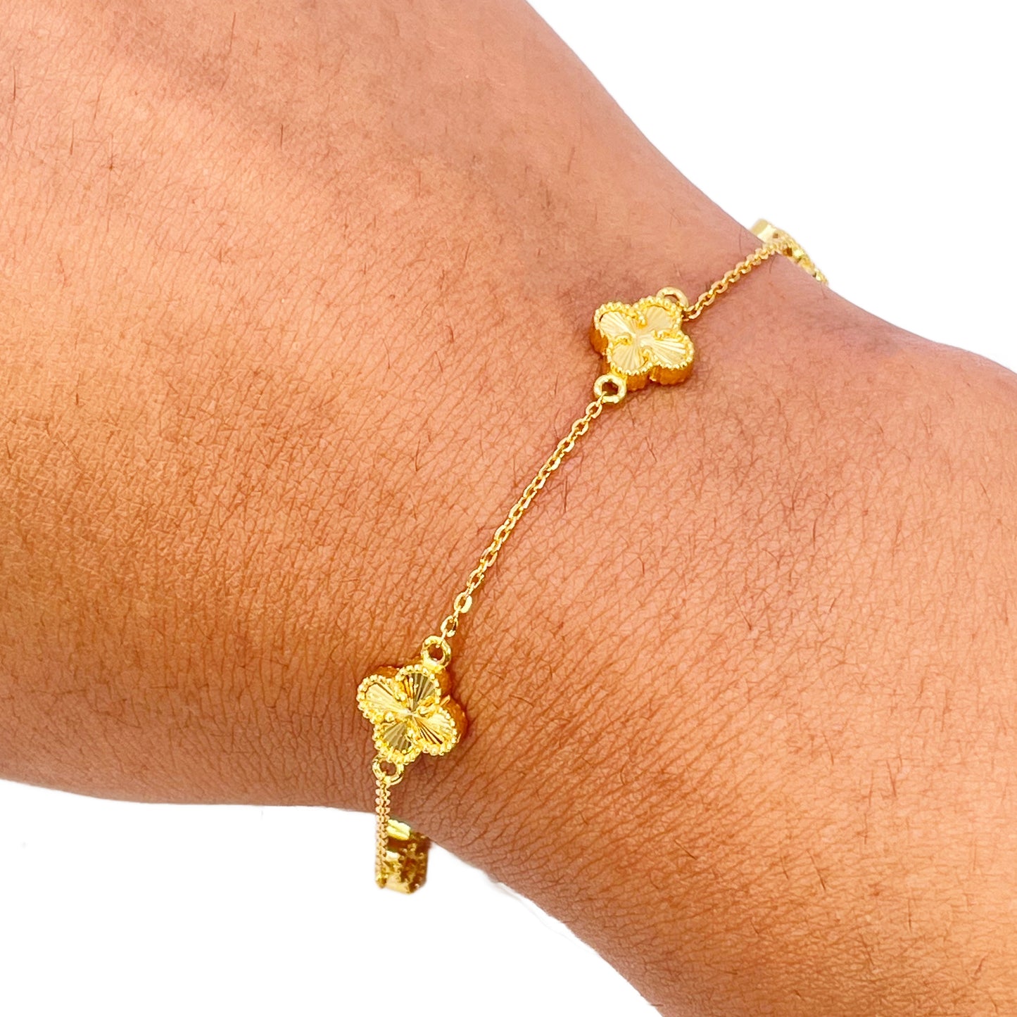 22 Karat Gelbgold Armband mit 5 Blumen-Kleeblättern und Diamantschliff, 19 cm